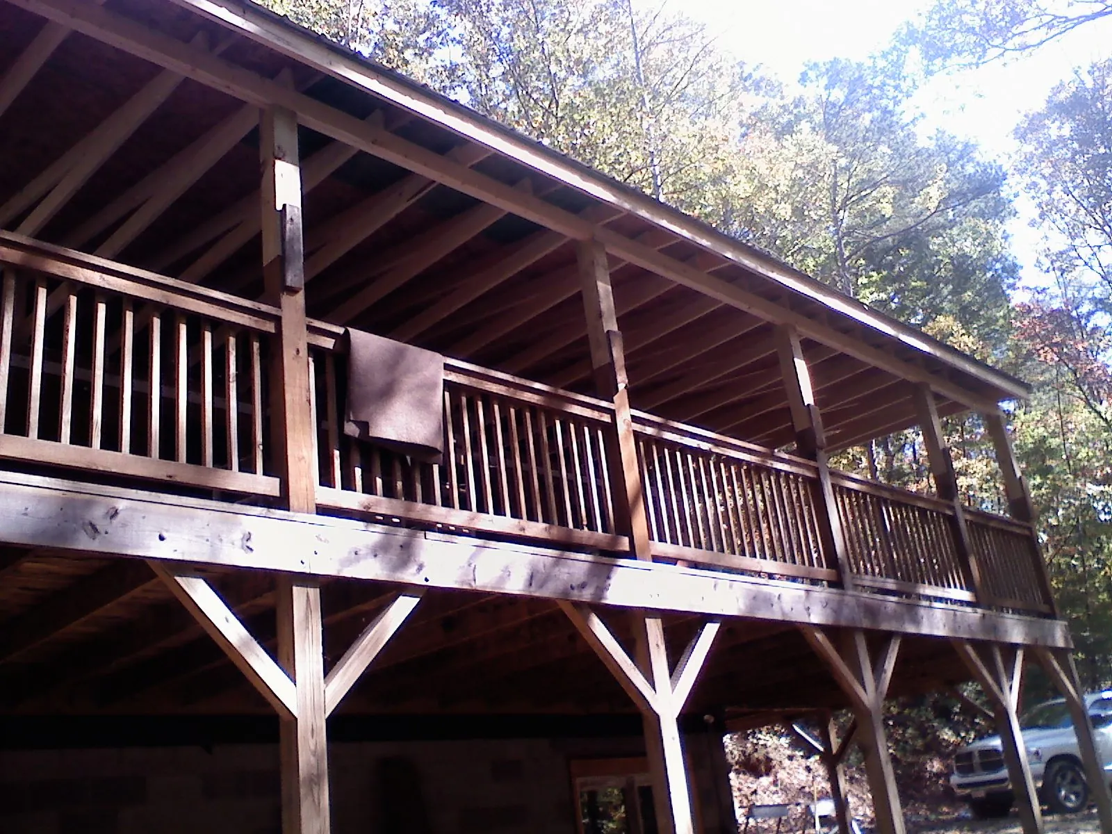 Timber framing under a new elevated porch and deck — Roof Leak Repair in Buzzards Bay by Roofing Brothers